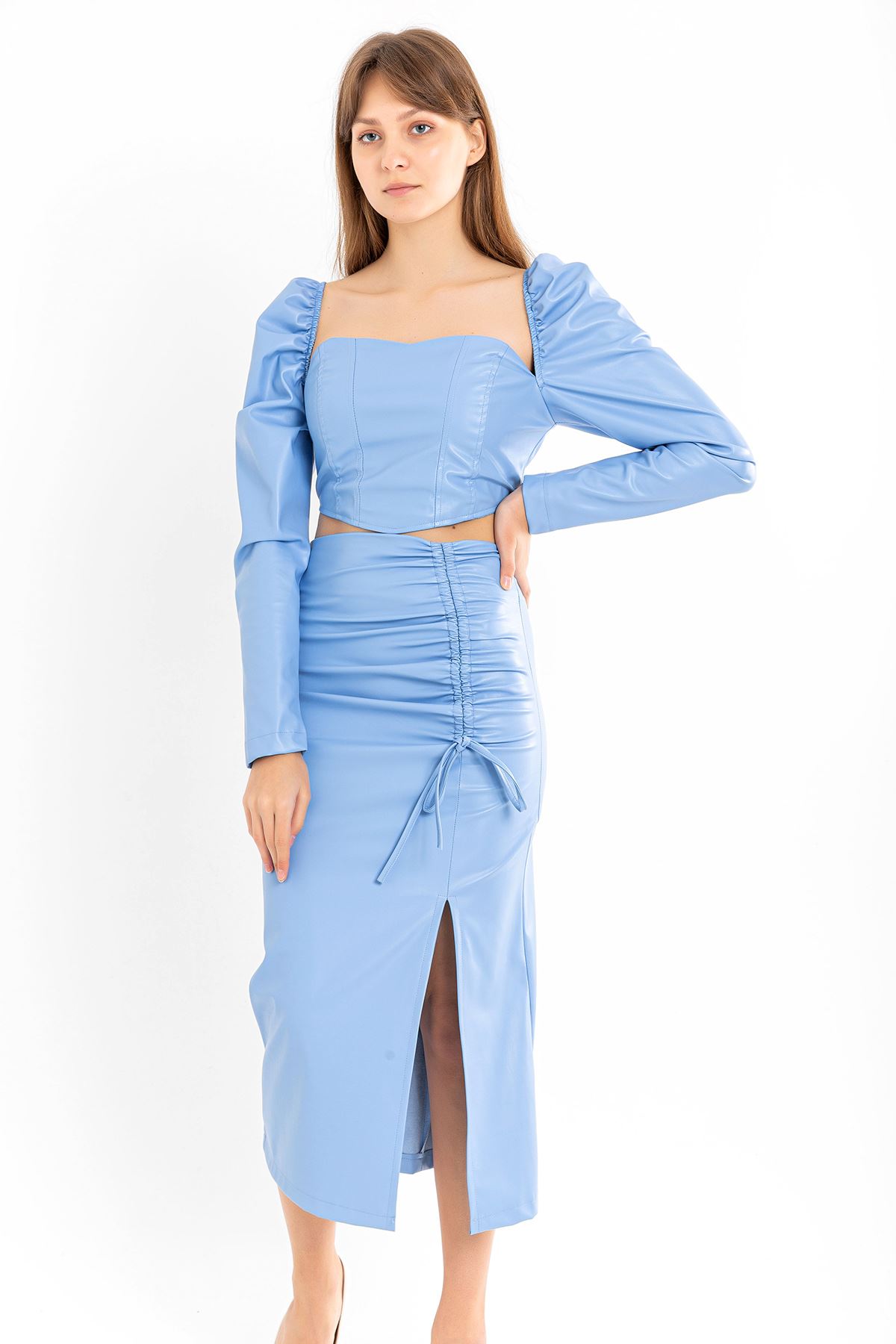 Picture of Deri Kumaş Diz Altı Boy Yırtmaçlı Büzgü Detaylı Kadın Etek-Mavi