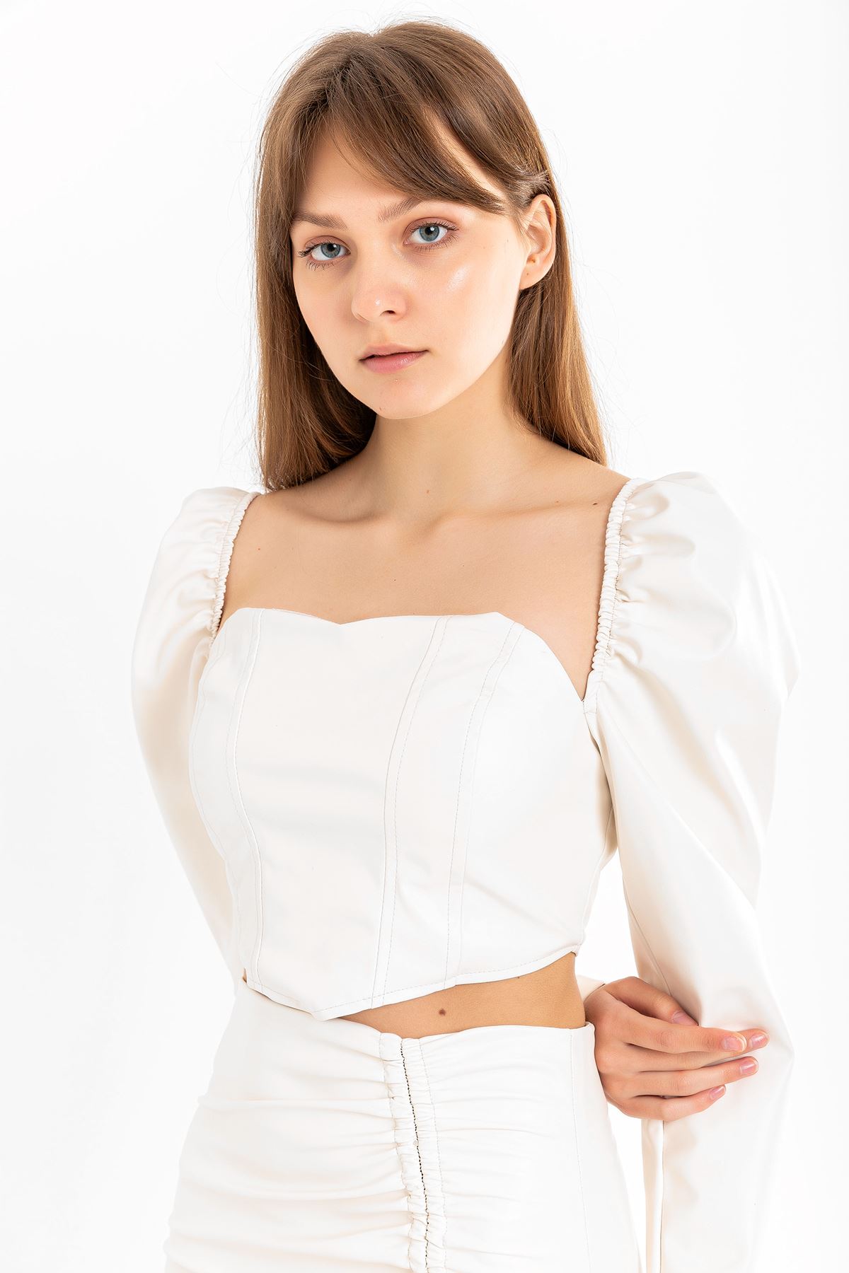 Picture of Deri Kumaş Straplez Kalp Yaka Fermuar Detaylı Kadın Crop-Ekru